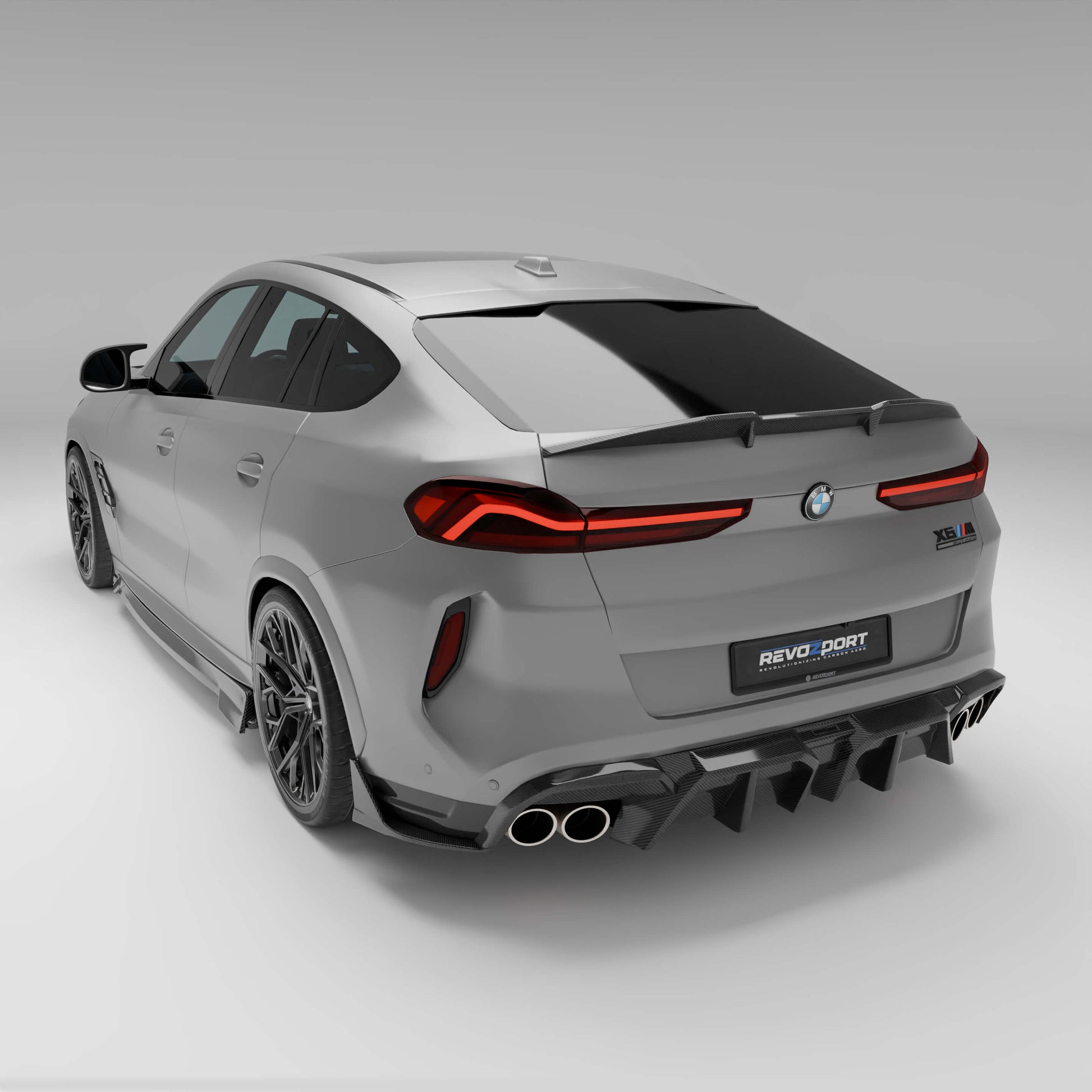 BMW X6M F96 LCI carbon fiber spoiler, angled studio view
