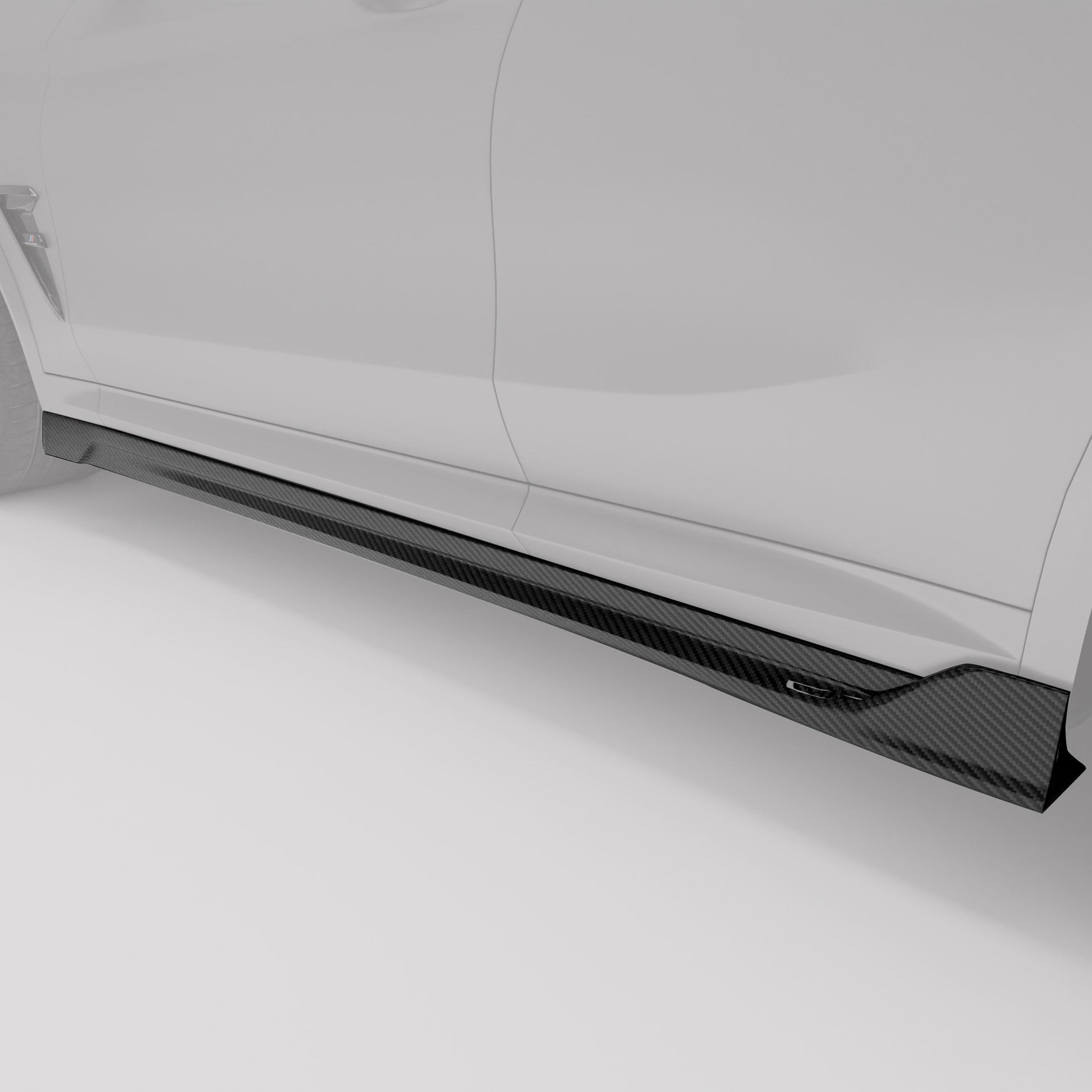 BMW X3M F97 LCI carbon side skirts highlighted on the rocker panel