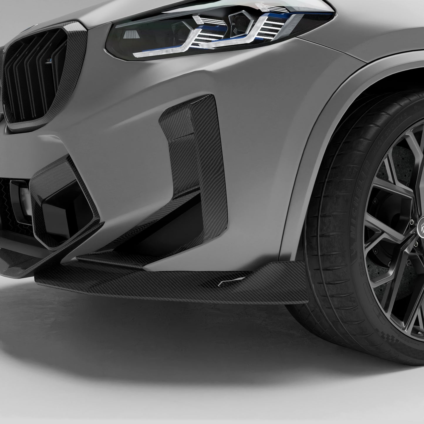 BMW X3M F97 LCI carbon fiber front intake covers rendering, front view