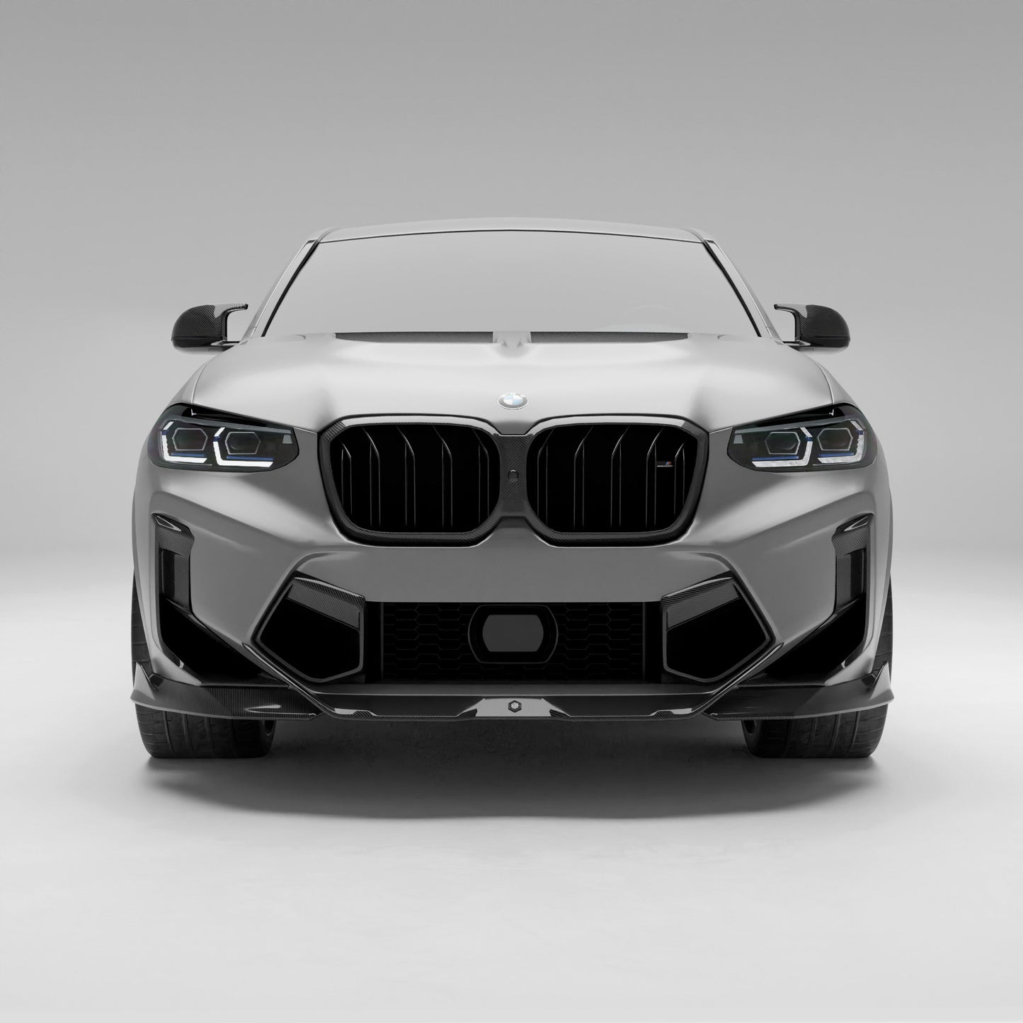 BMW X4M F98 LCI carbon fiber front bumper vents straight-on view