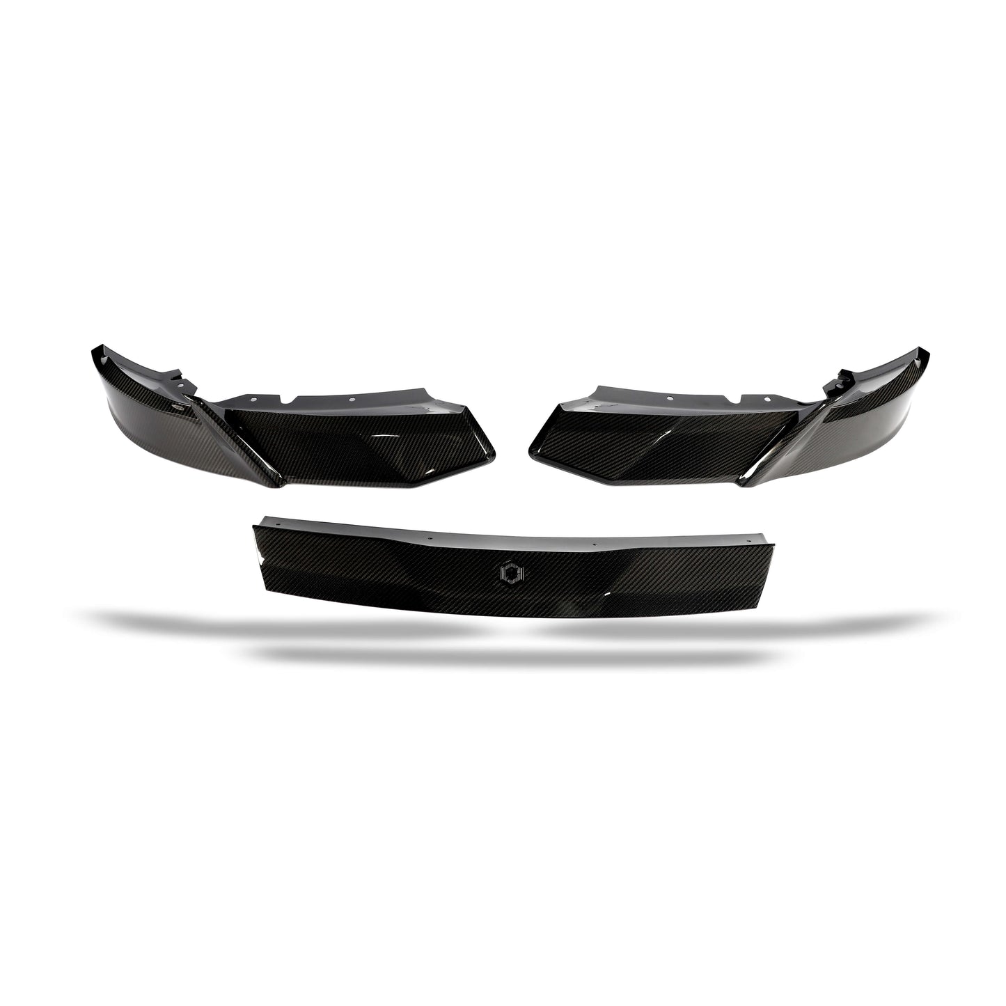BMW XM G09 carbon fiber front lip detail of the woven carbon surface