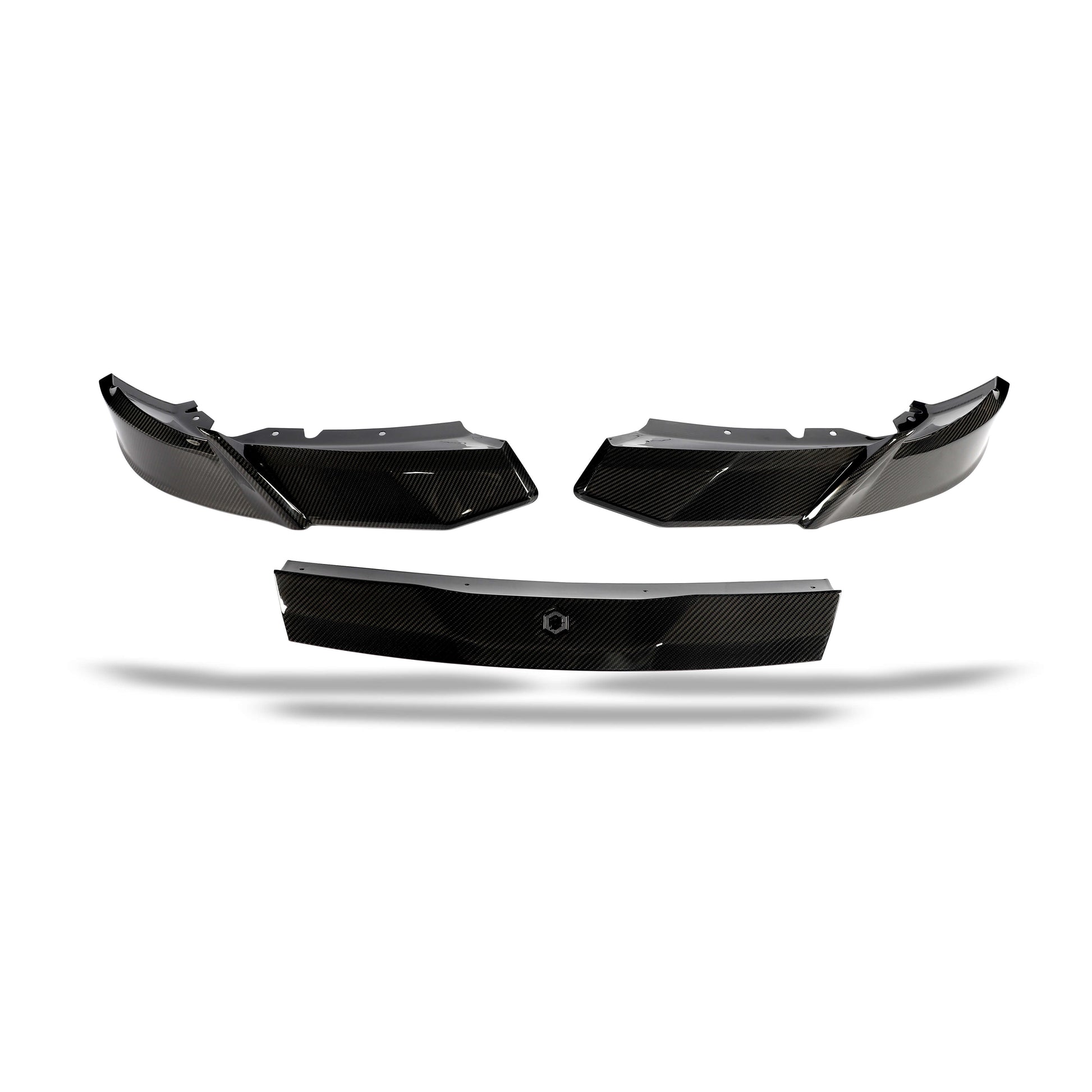BMW XM G09 carbon fiber front lip detail of the woven carbon surface
