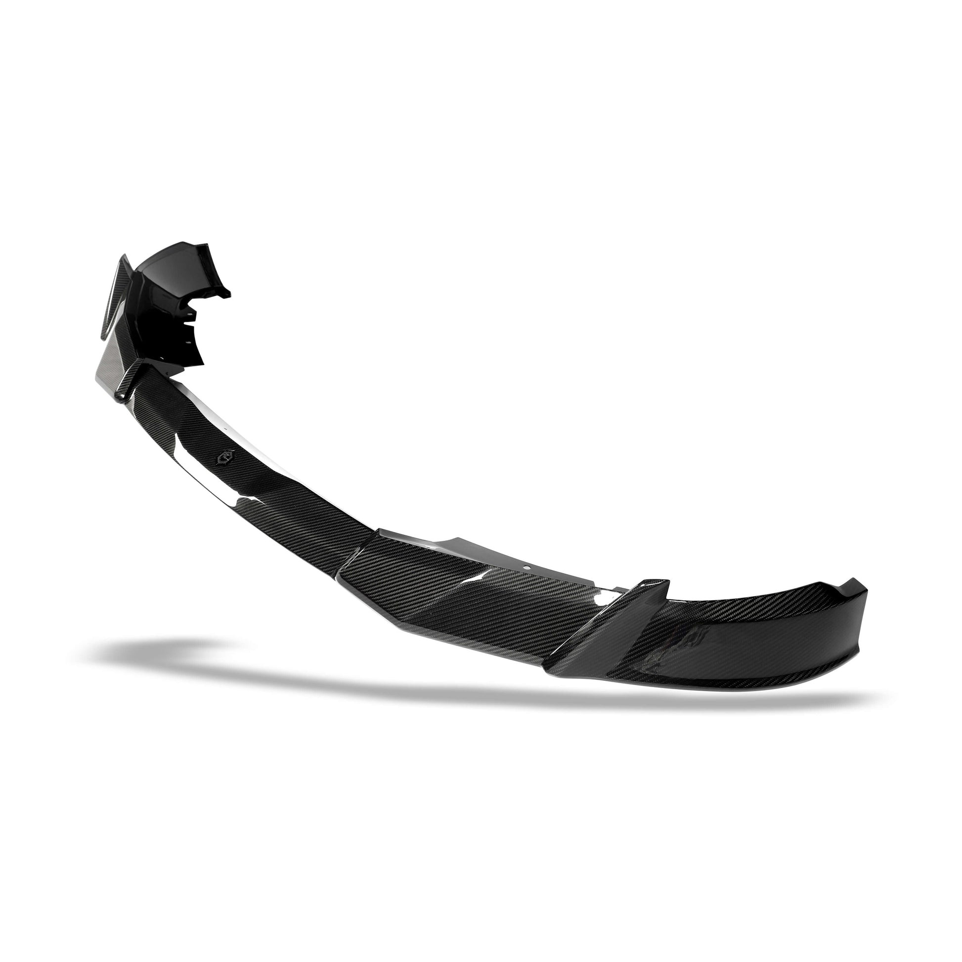 BMW XM G09 carbon fiber front lip side profile showing extension depth
