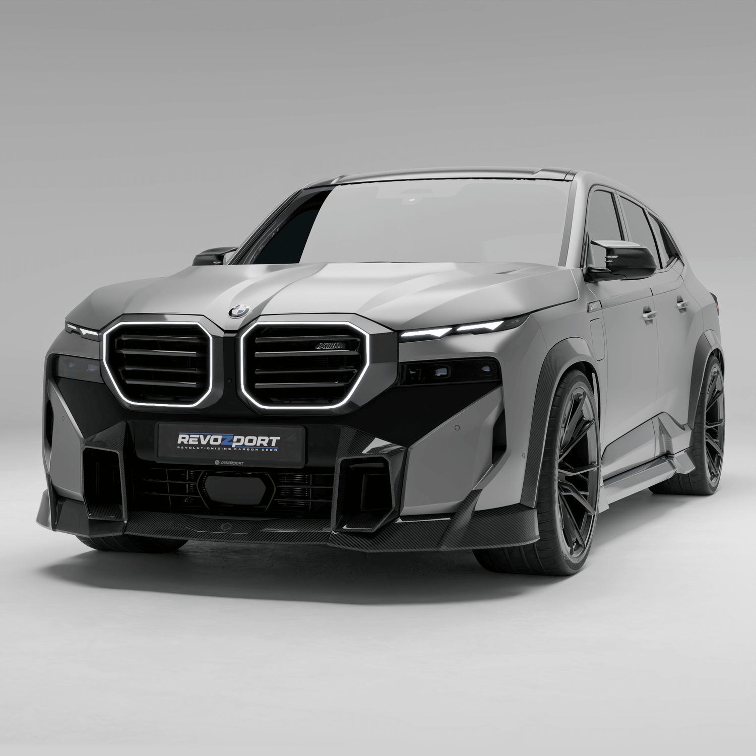 BMW XM G09 carbon fiber front lip shown in full studio product view