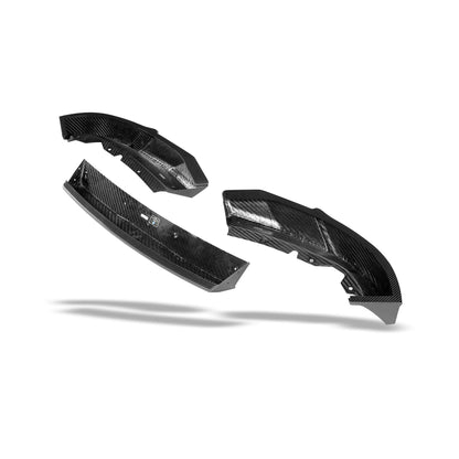 BMW XM G09 carbon fiber front lip underside view of the mounting edge
