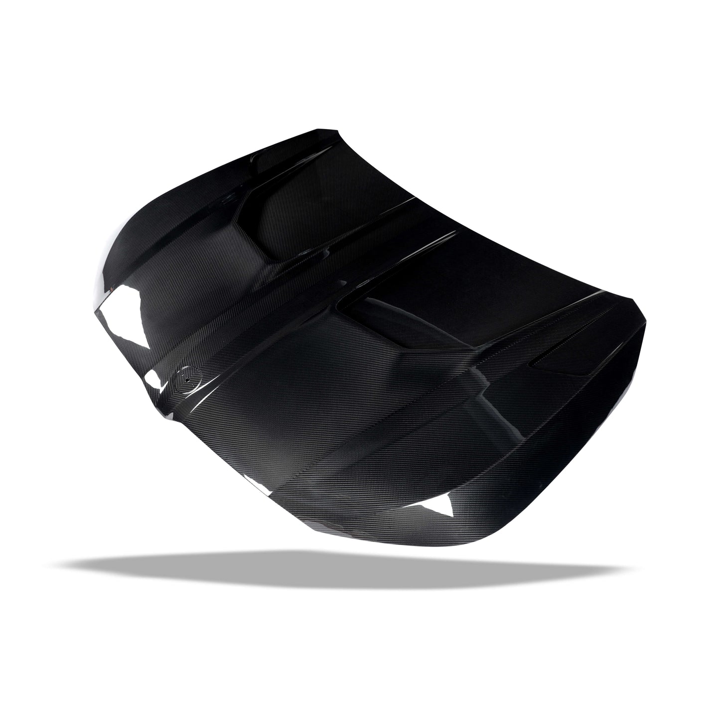 BMW XM G09 carbon fiber hood angled view emphasizing front-end presence