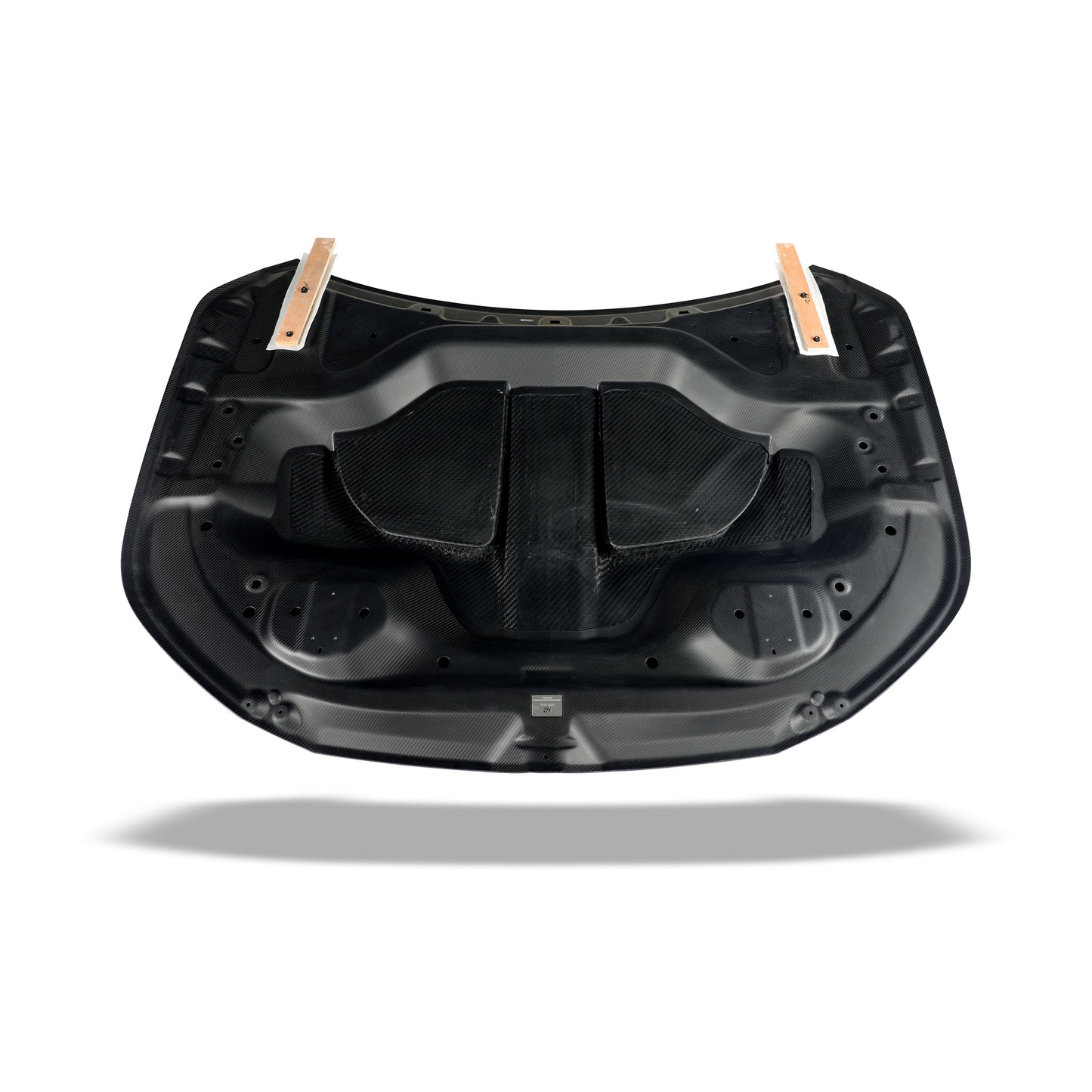 BMW XM G09 carbon fiber hood rear-edge view near the windscreen base
