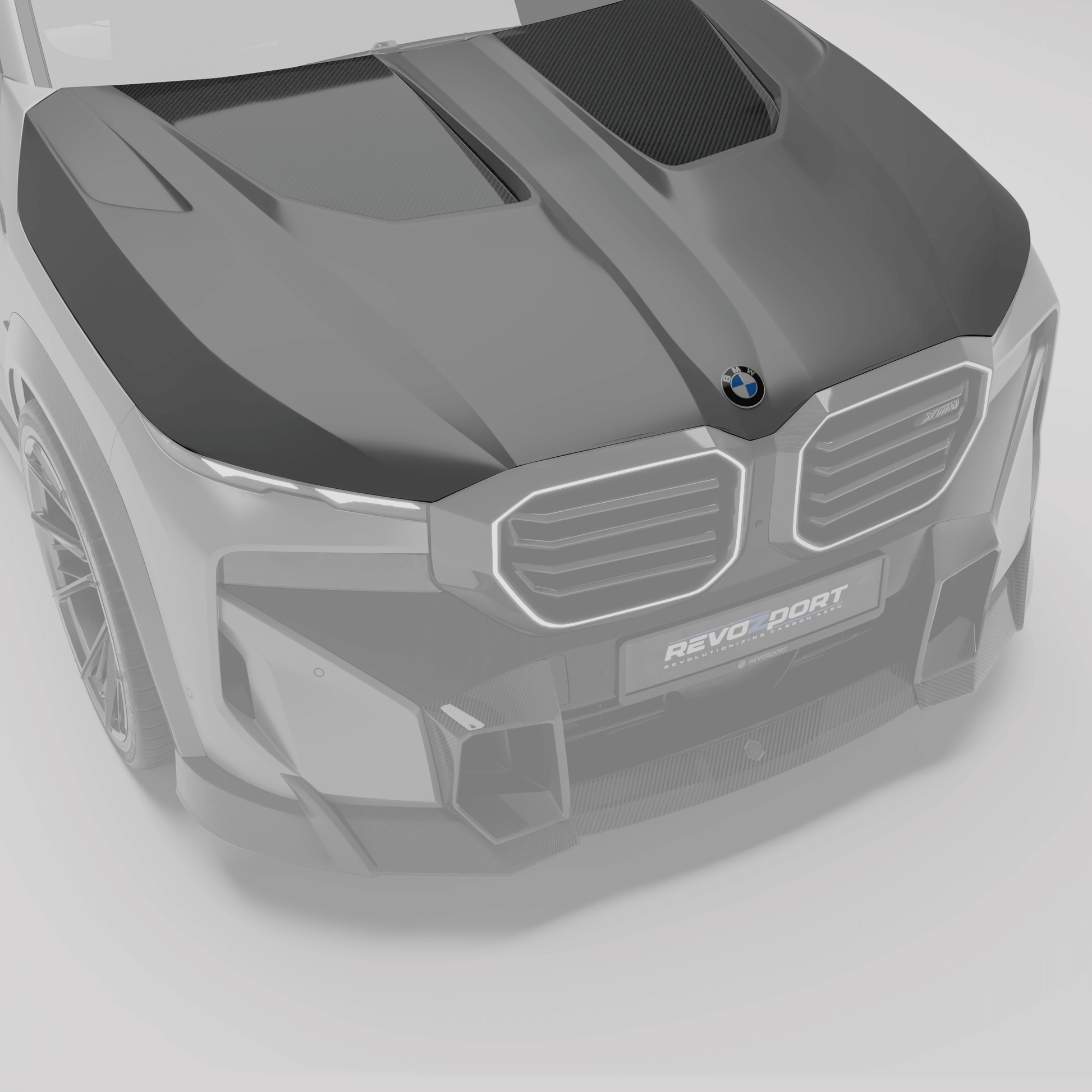 BMW XM G09 carbon fiber hood from a front angle showing sculpted contours