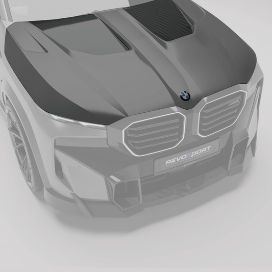 BMW XM G09 carbon fiber hood from a front angle showing sculpted contours