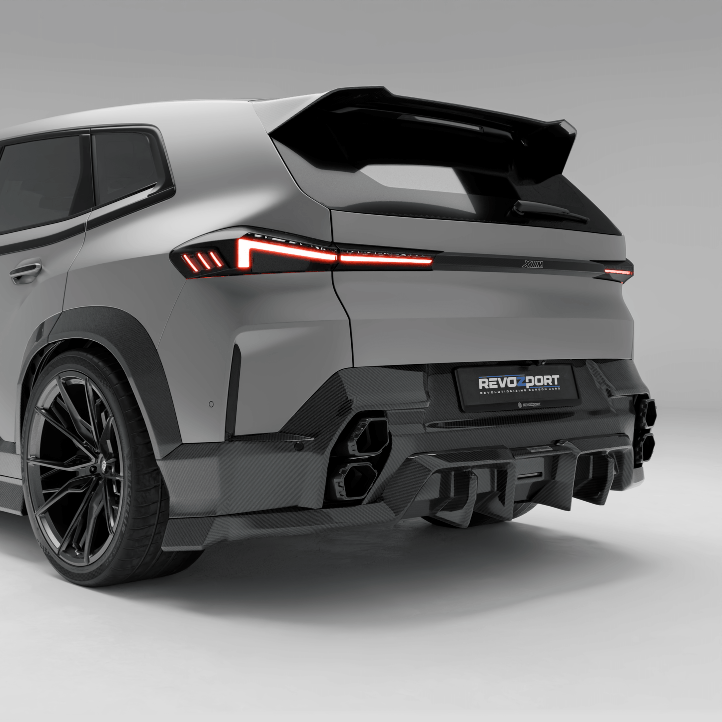 BMW XM G09 carbon fiber rear diffuser rear straight-on view