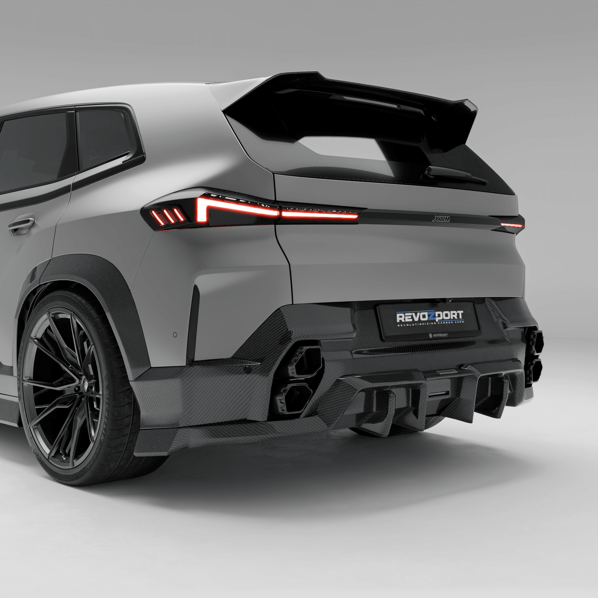 BMW XM G09 carbon fiber rear diffuser rear straight-on view
