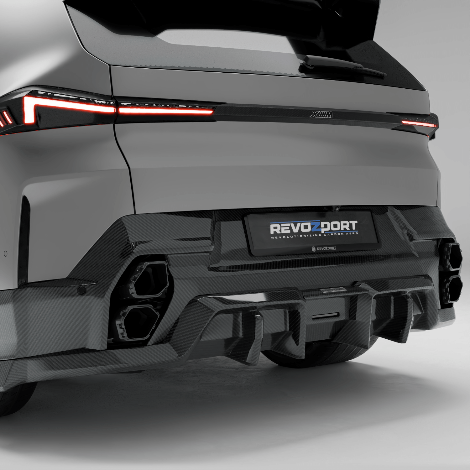 BMW XM G09 carbon fiber rear spoiler mounted on trunk rear view