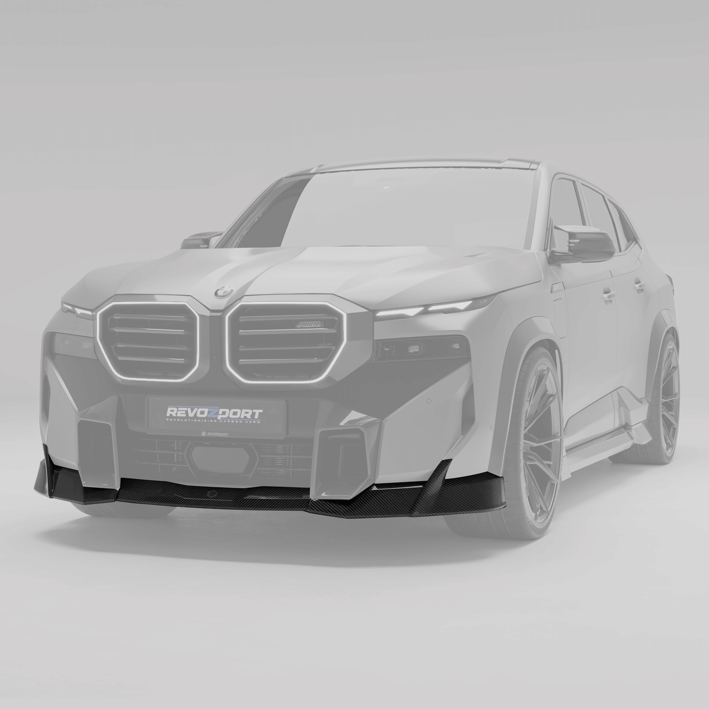 BMW XM G09 carbon fiber front lip from a front angle showing lower stance