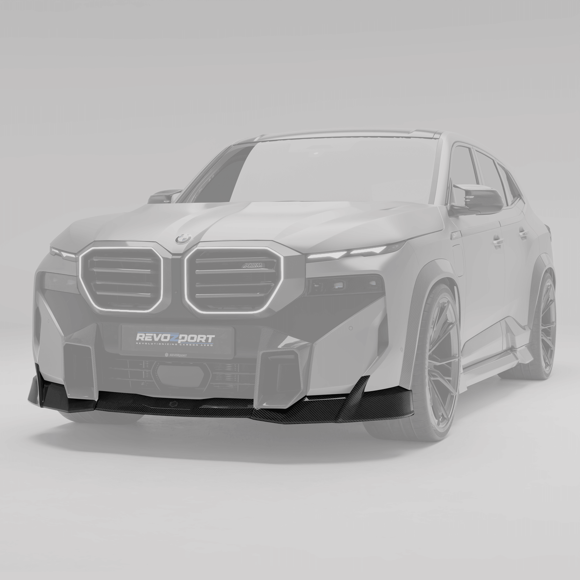 BMW XM G09 carbon fiber front lip from a front angle showing lower stance