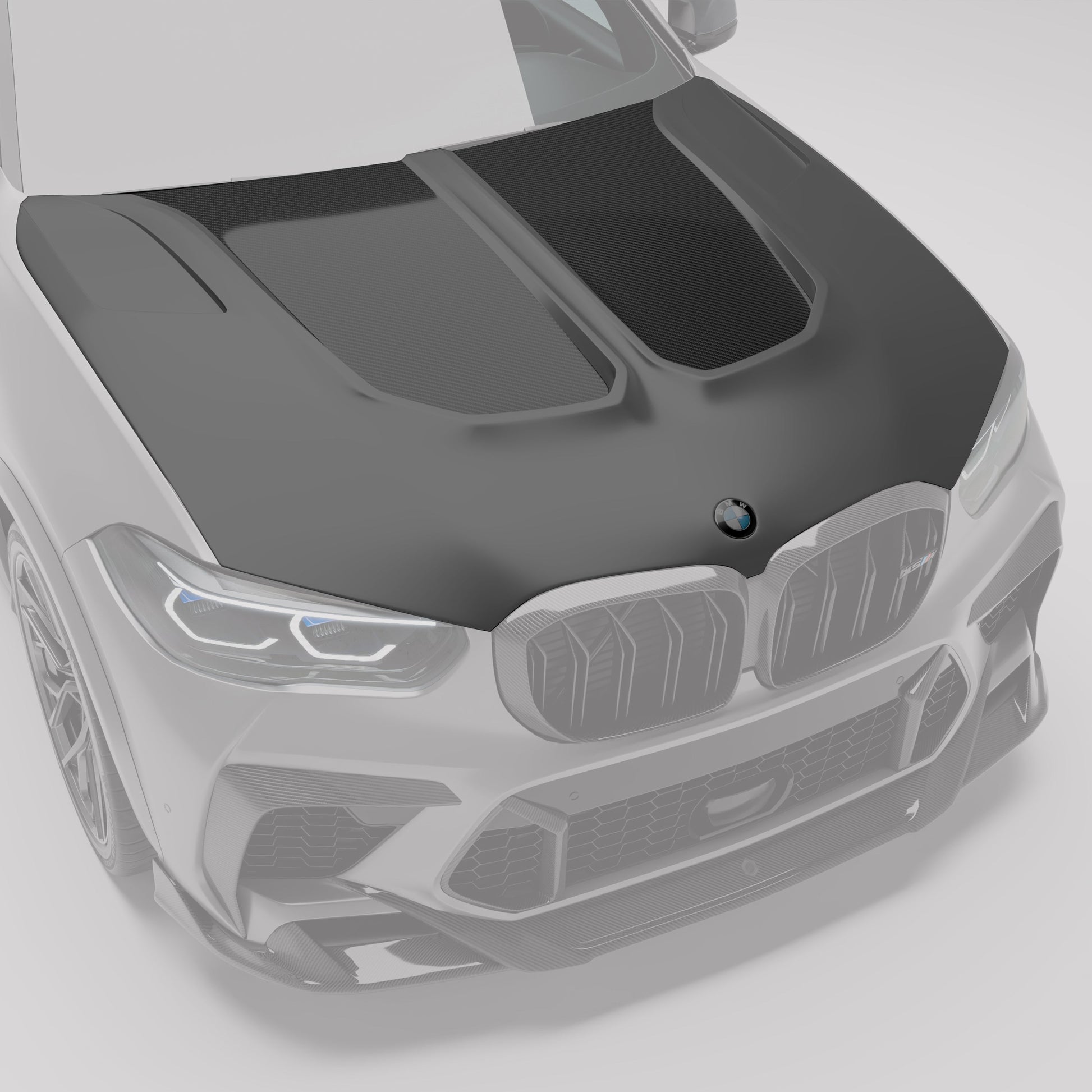 BMW X5M F95 carbon fiber hood, angled detail of vents and weave