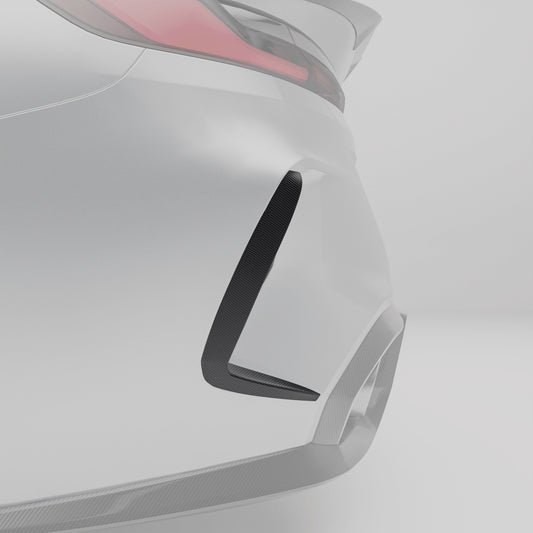 Close-up of the carbon fiber weave on the M8 rear bumper canard