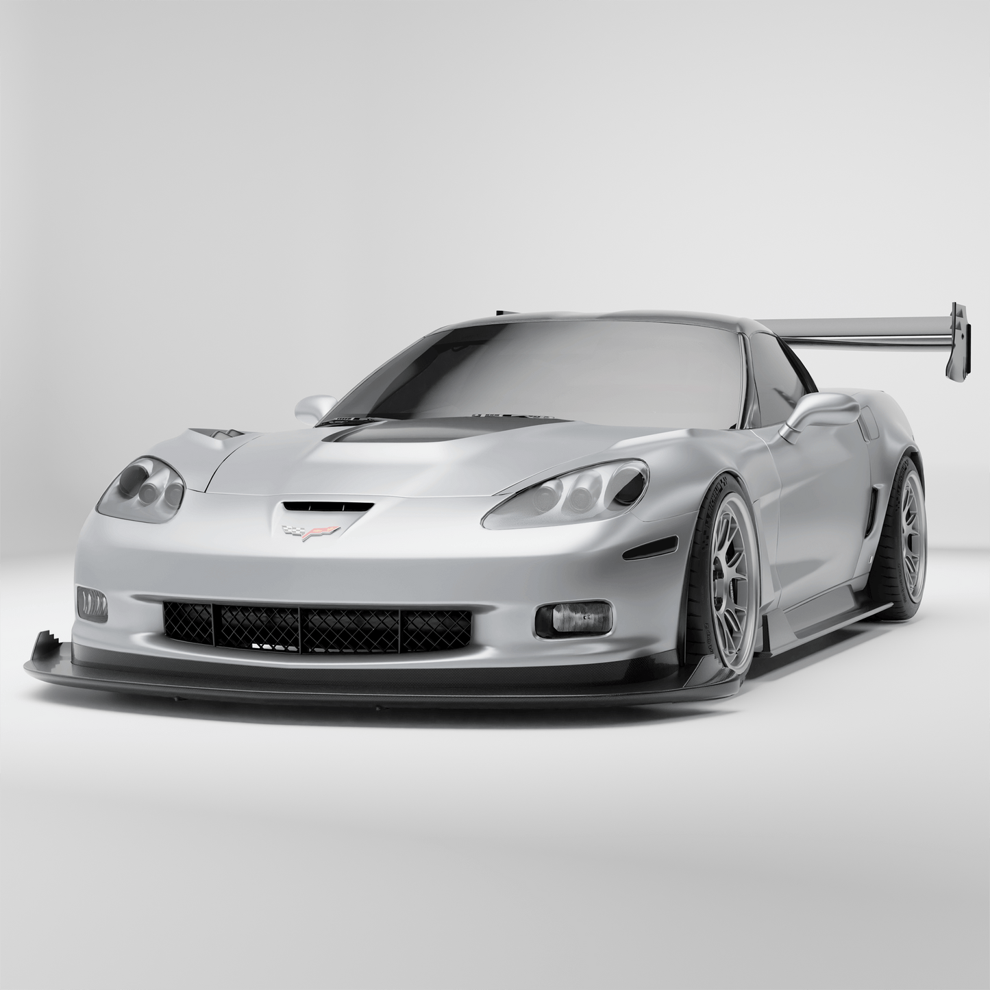 Corvette C6 carbon fiber front splitter and air dam, full studio view