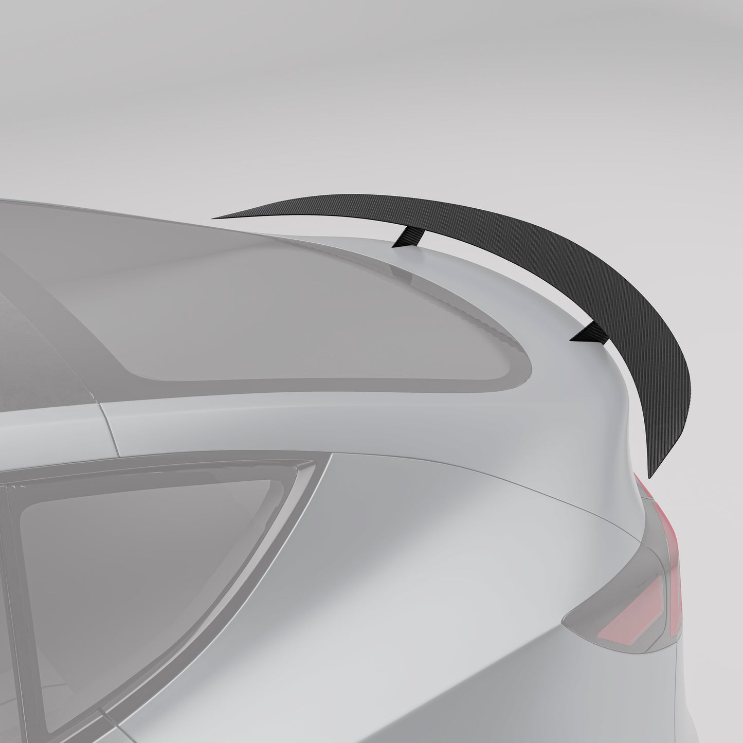 Carbon fiber rear spoiler shown at an angle on Model Y