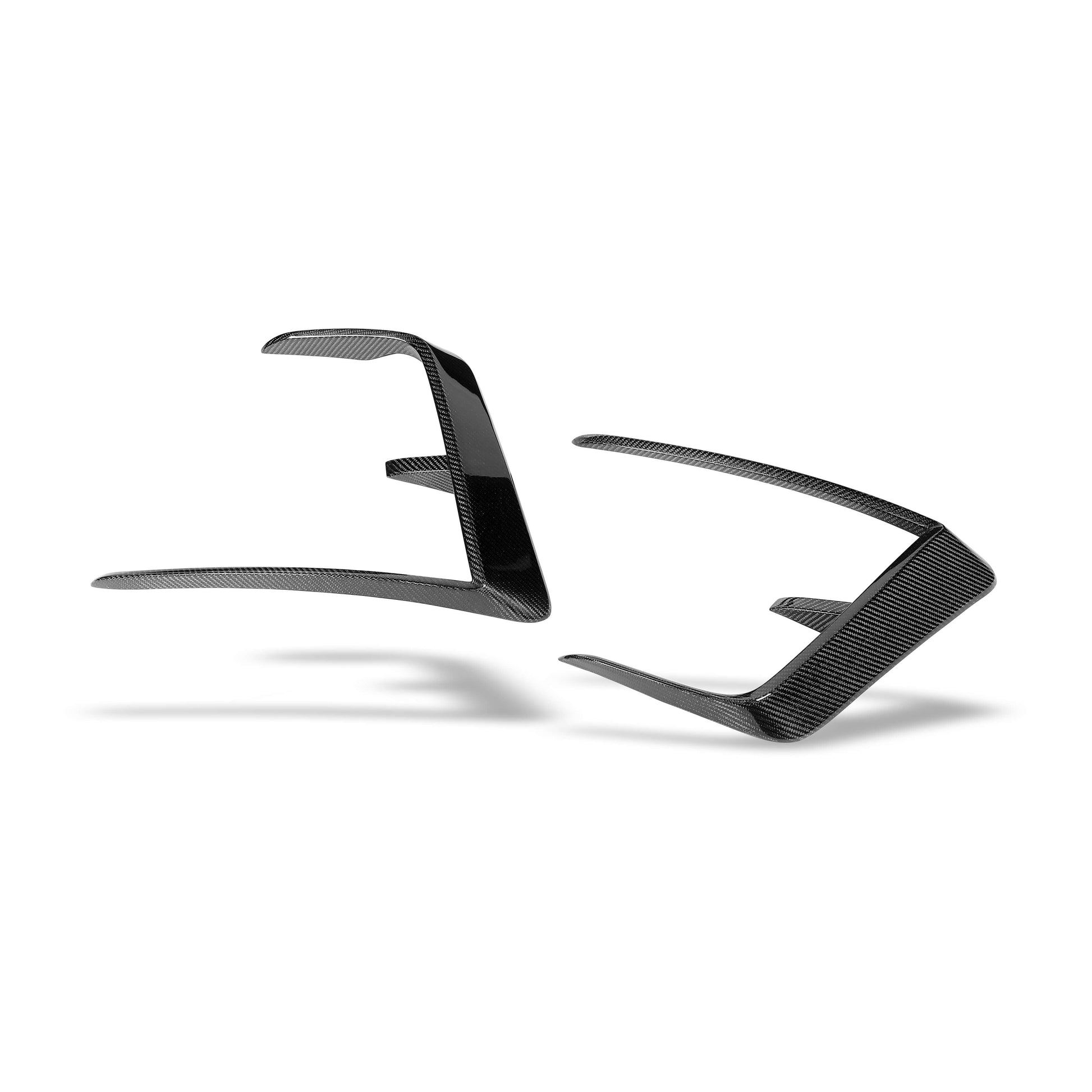 Carbon fiber canard edge profile against the bumper surface
