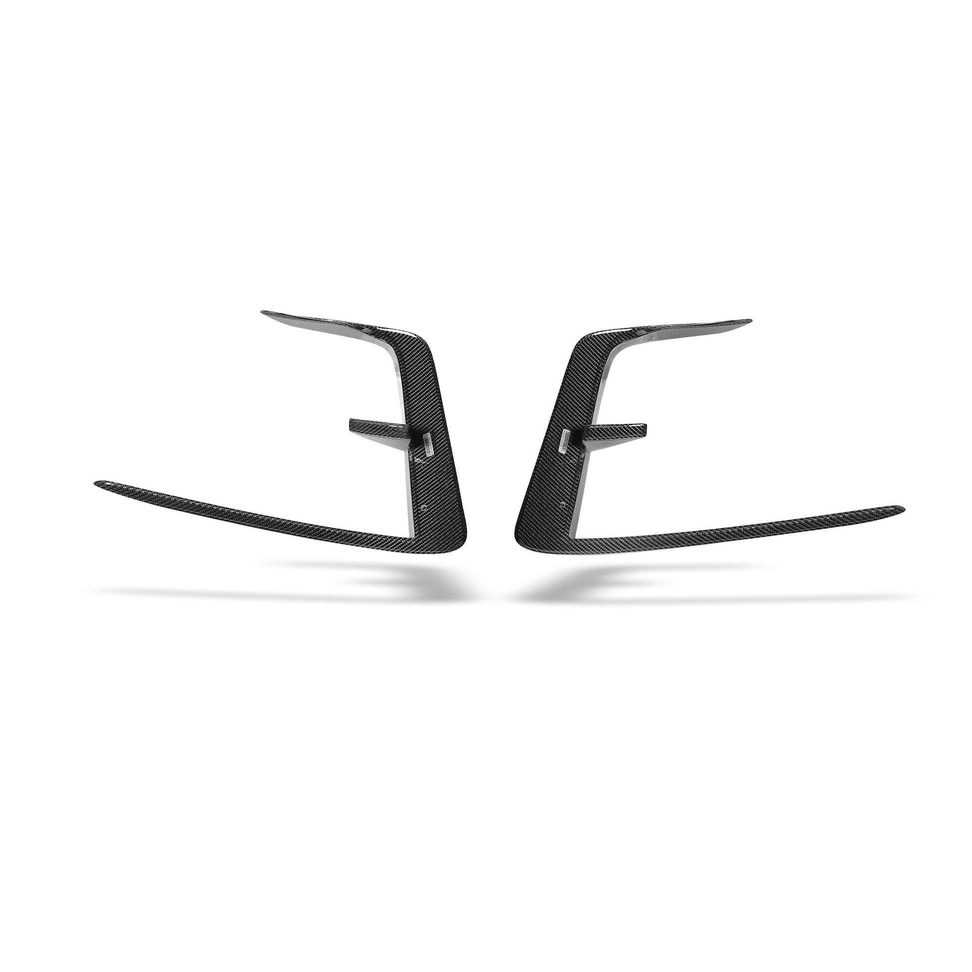 Pair of carbon fiber canards on the front bumper of Tesla Model Y