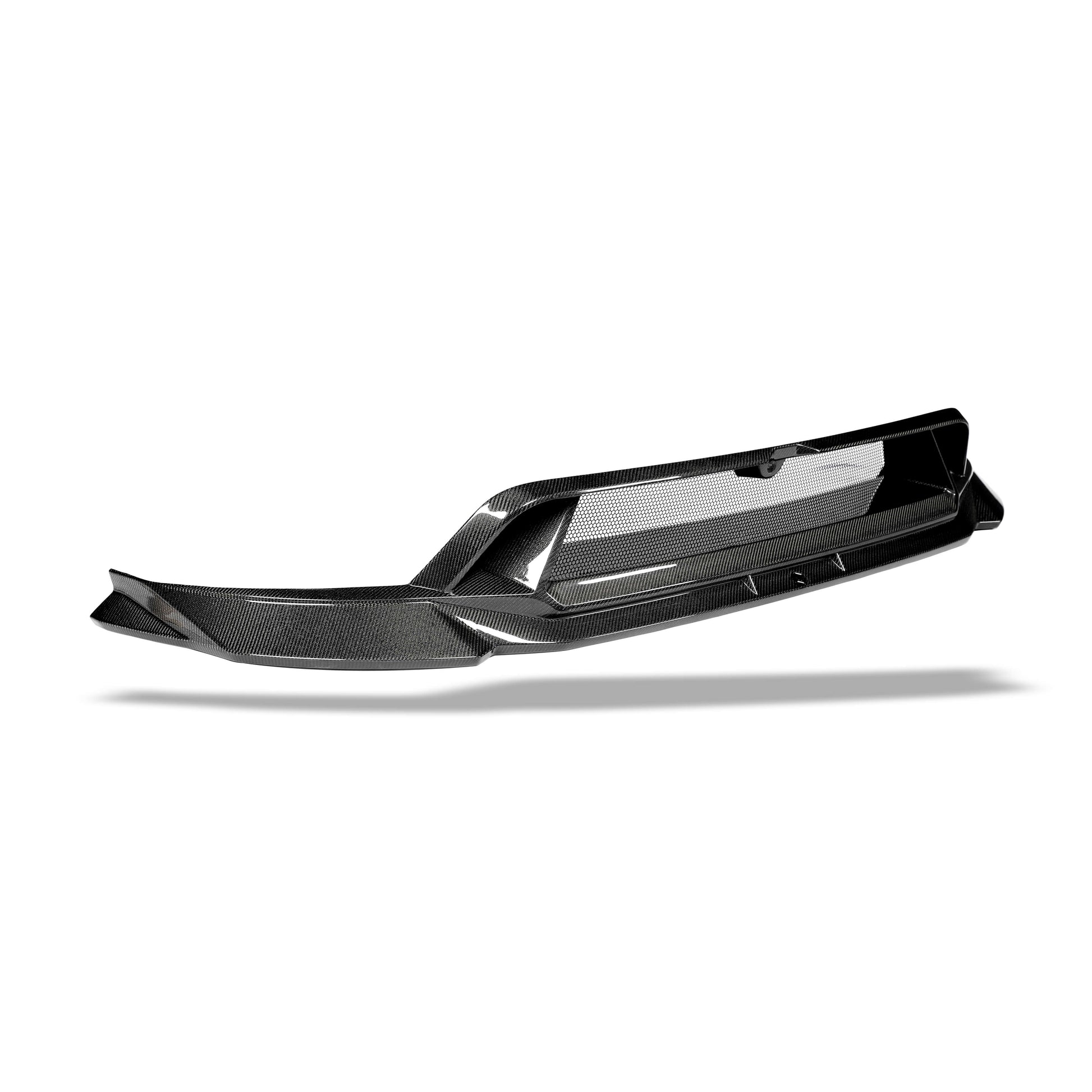 Gloss carbon weave texture along the Model Y front lip edge