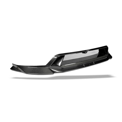 Gloss carbon weave texture along the Model Y front lip edge