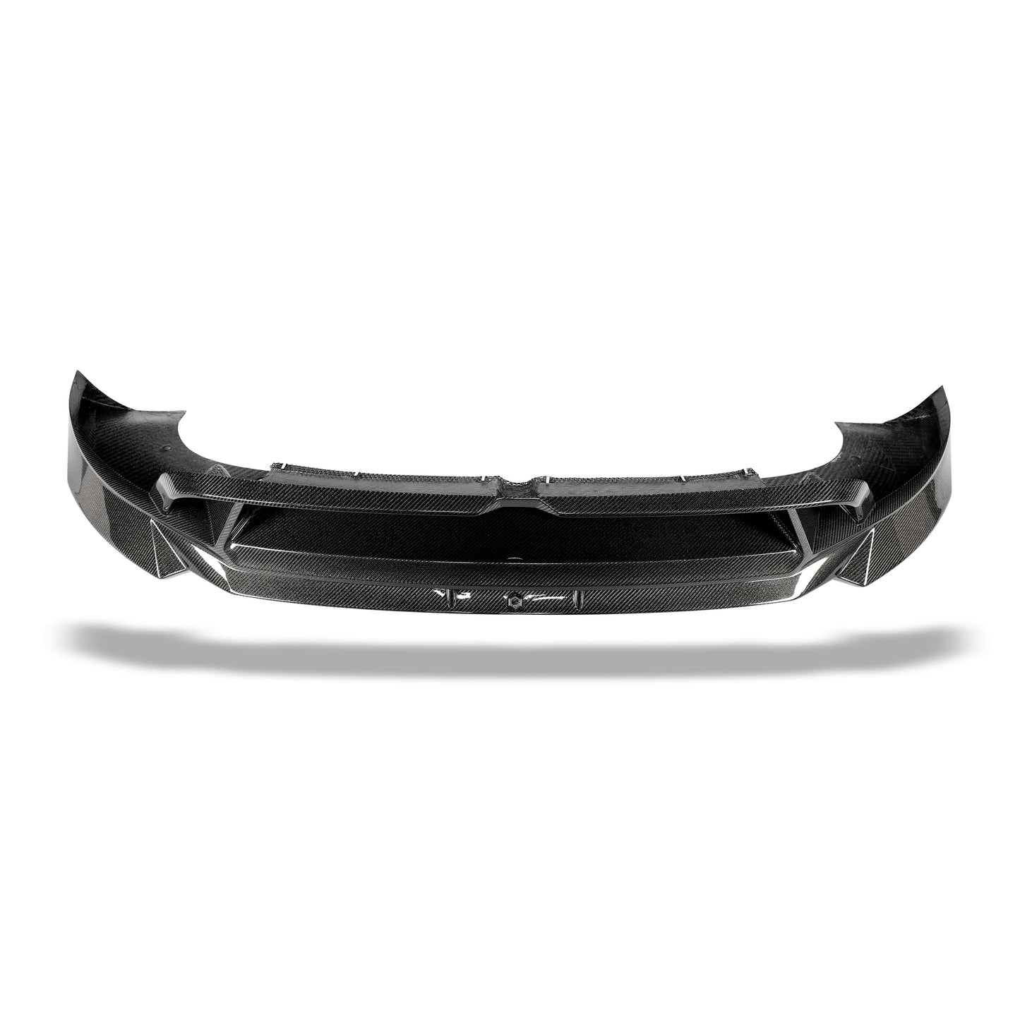 Angled view of the front lip lowering the stance of Model Y
