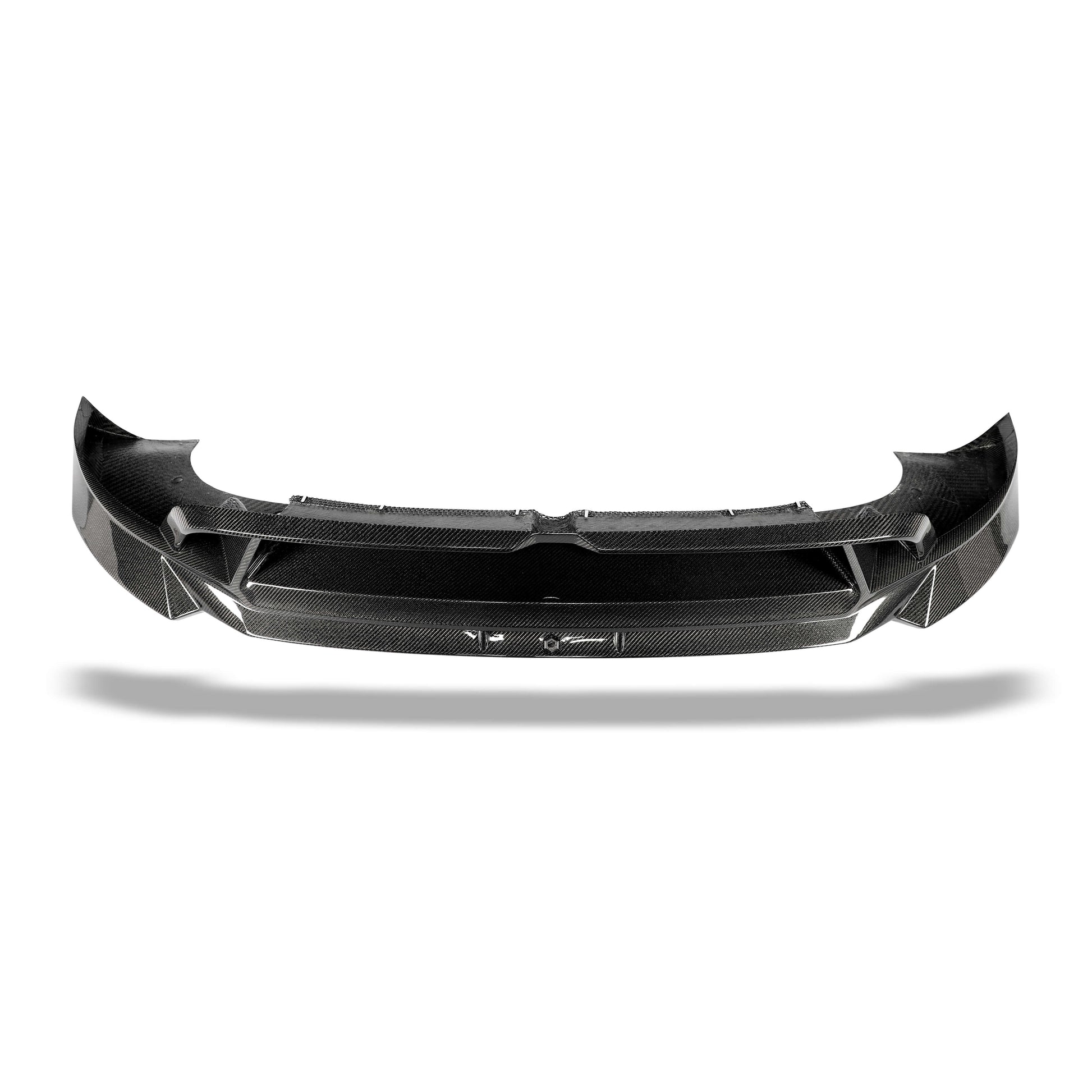 Angled view of the front lip lowering the stance of Model Y