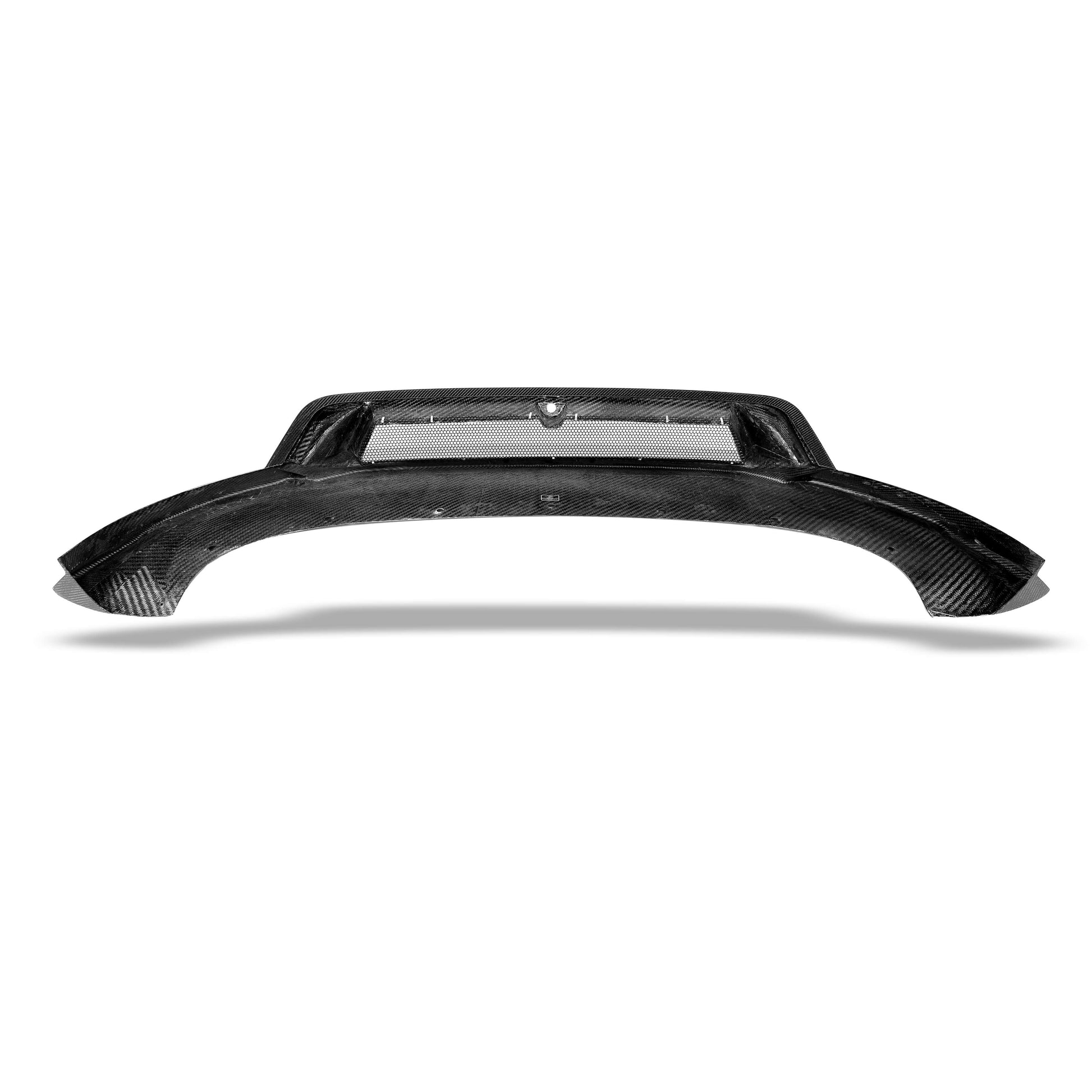 Front lip splitter profile against the lower bumper of Tesla Model Y