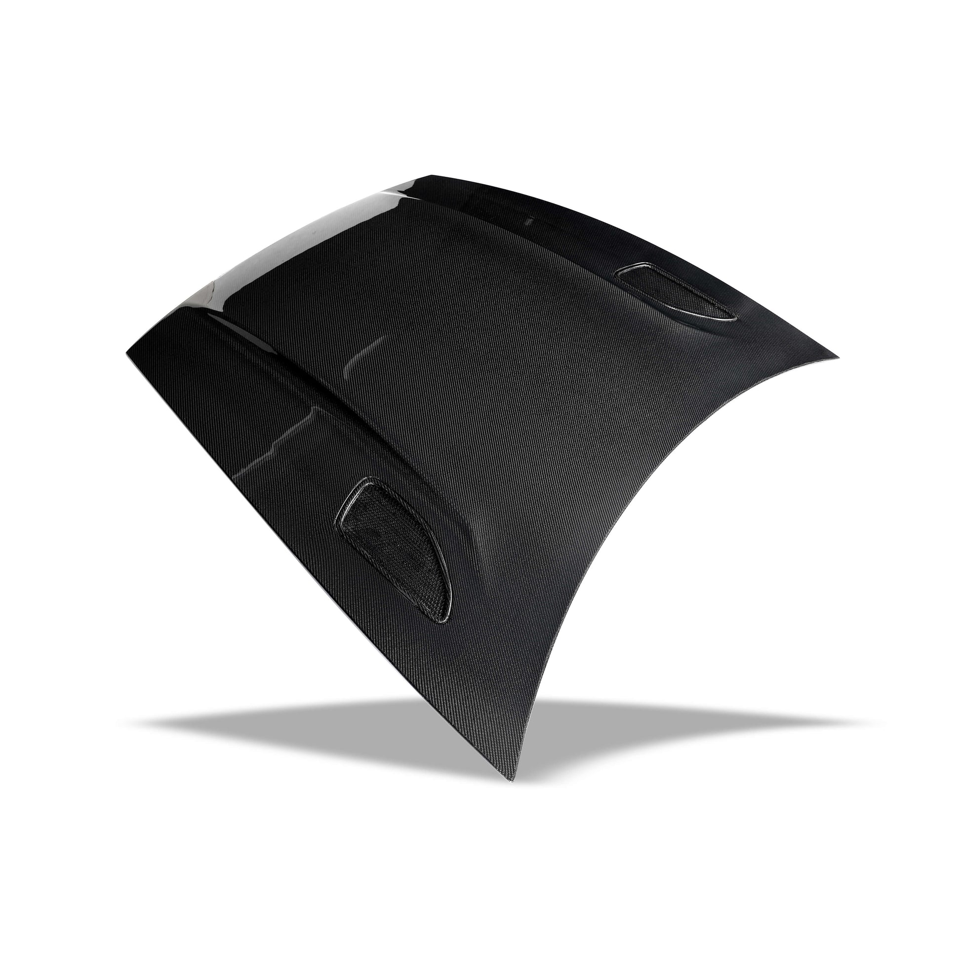 Overhead look at the gloss carbon weave on the Model Y hood