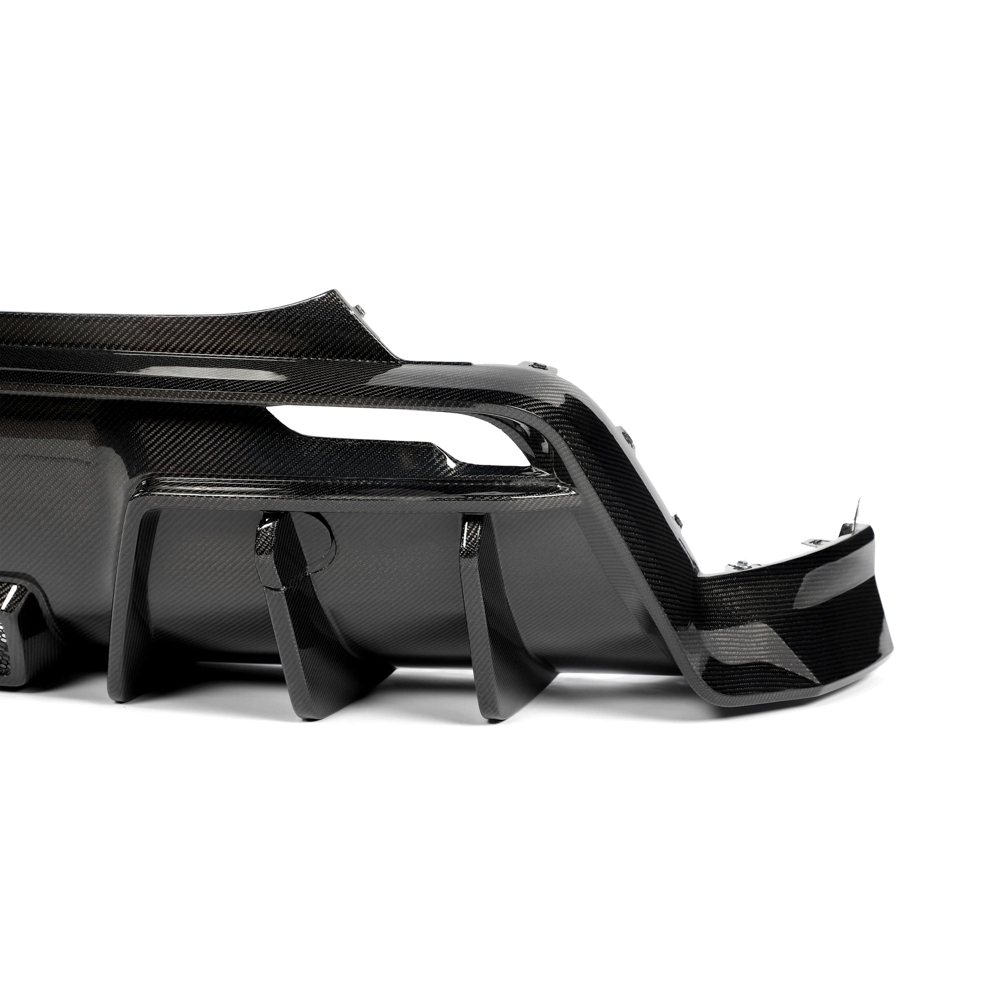 Tesla Model Y carbon fiber rear diffuser, edge definition close-up