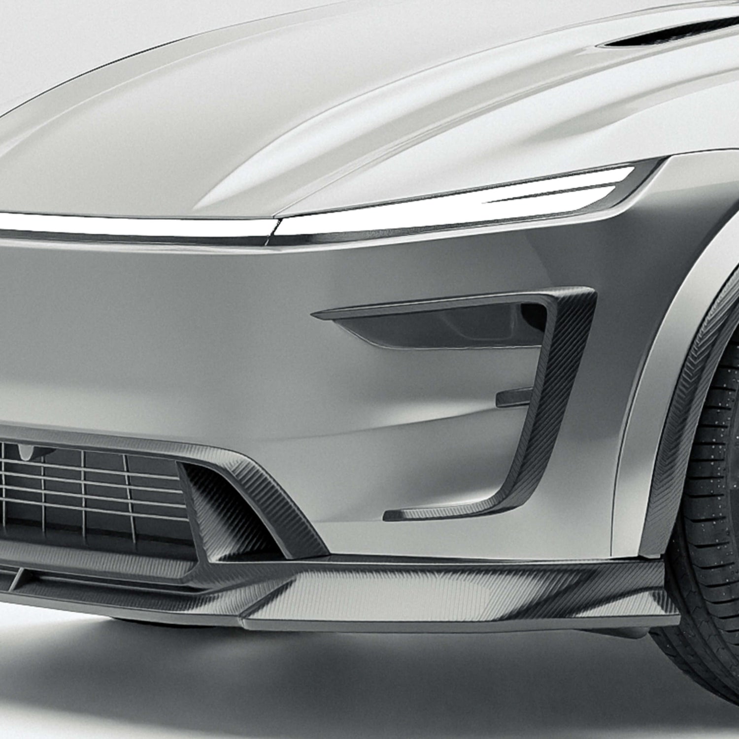 Tesla Model Y facelift carbon fiber front bumper canards mounted on the car