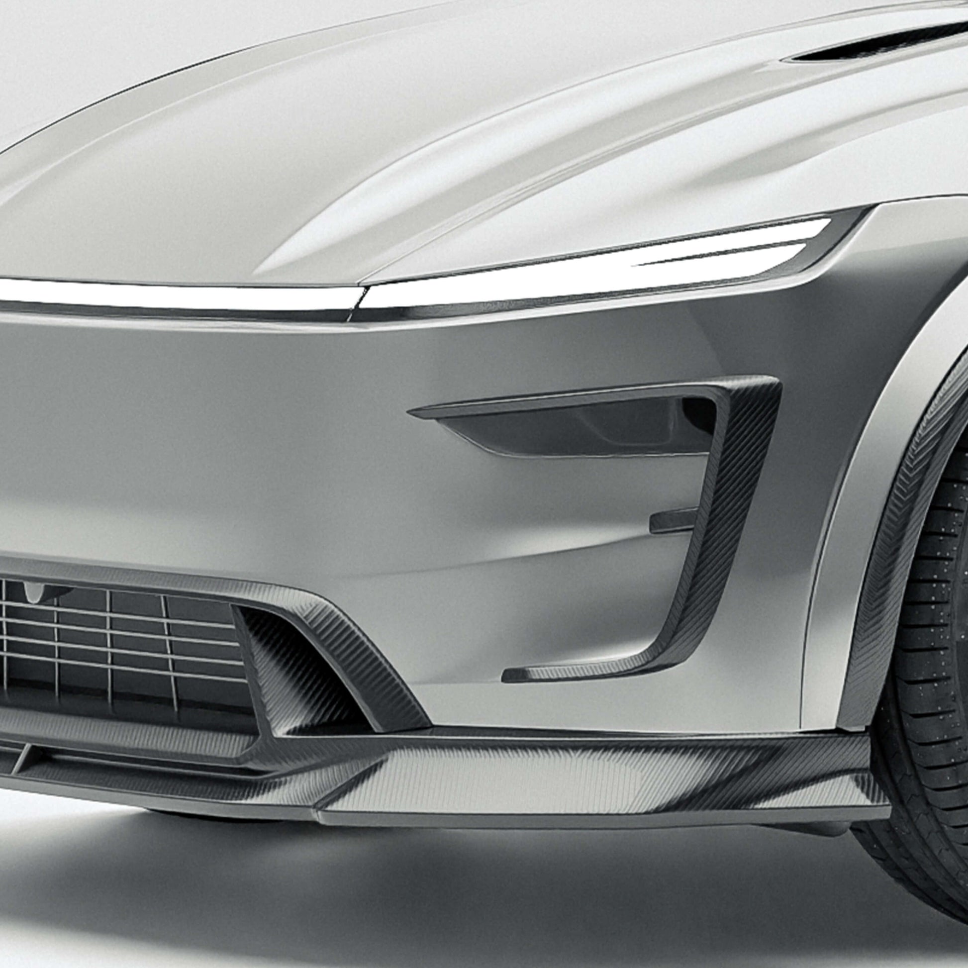 Tesla Model Y facelift carbon fiber front bumper canards mounted on the car