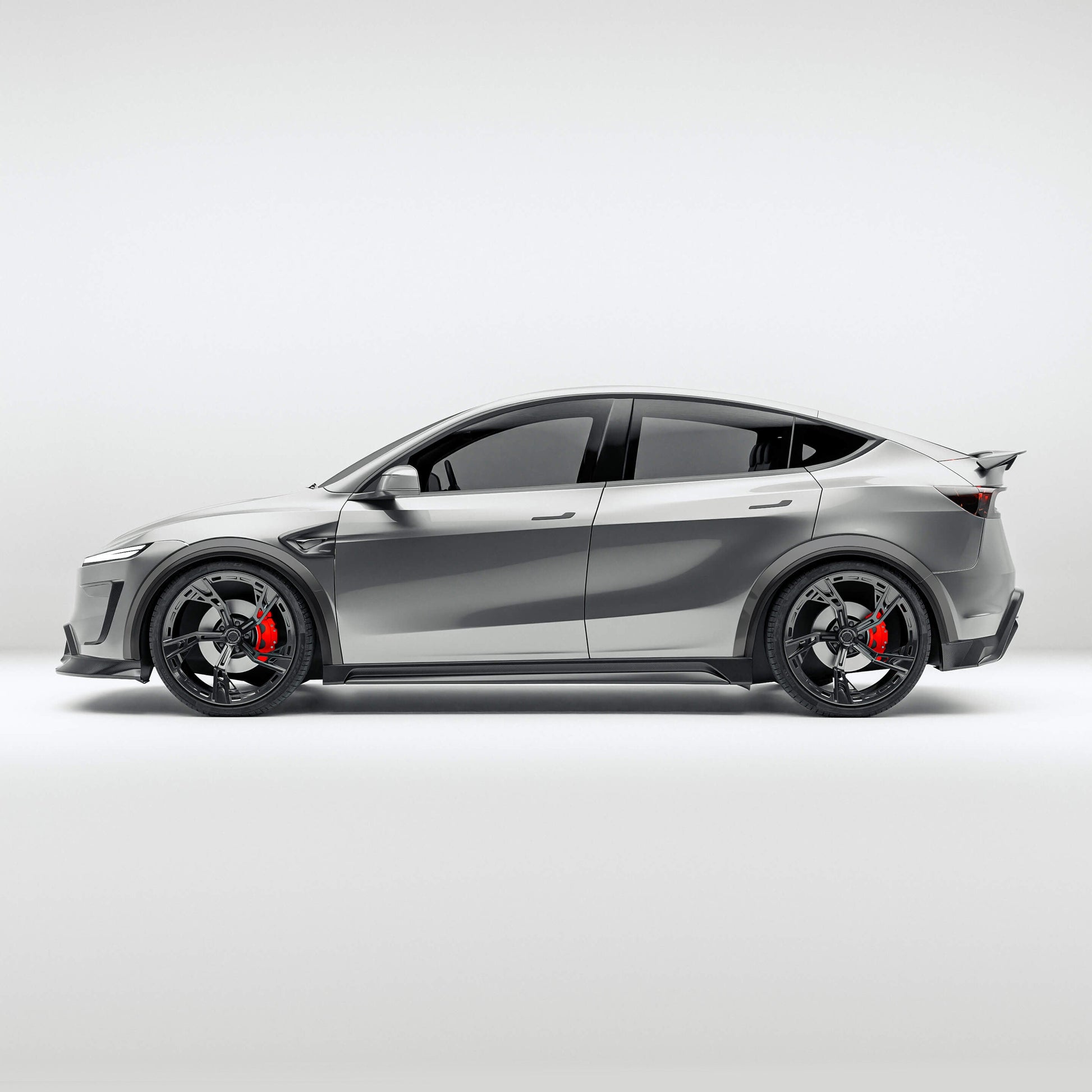 Tesla Model Y facelift carbon fiber wheel arch trims, front three-quarter view on the car