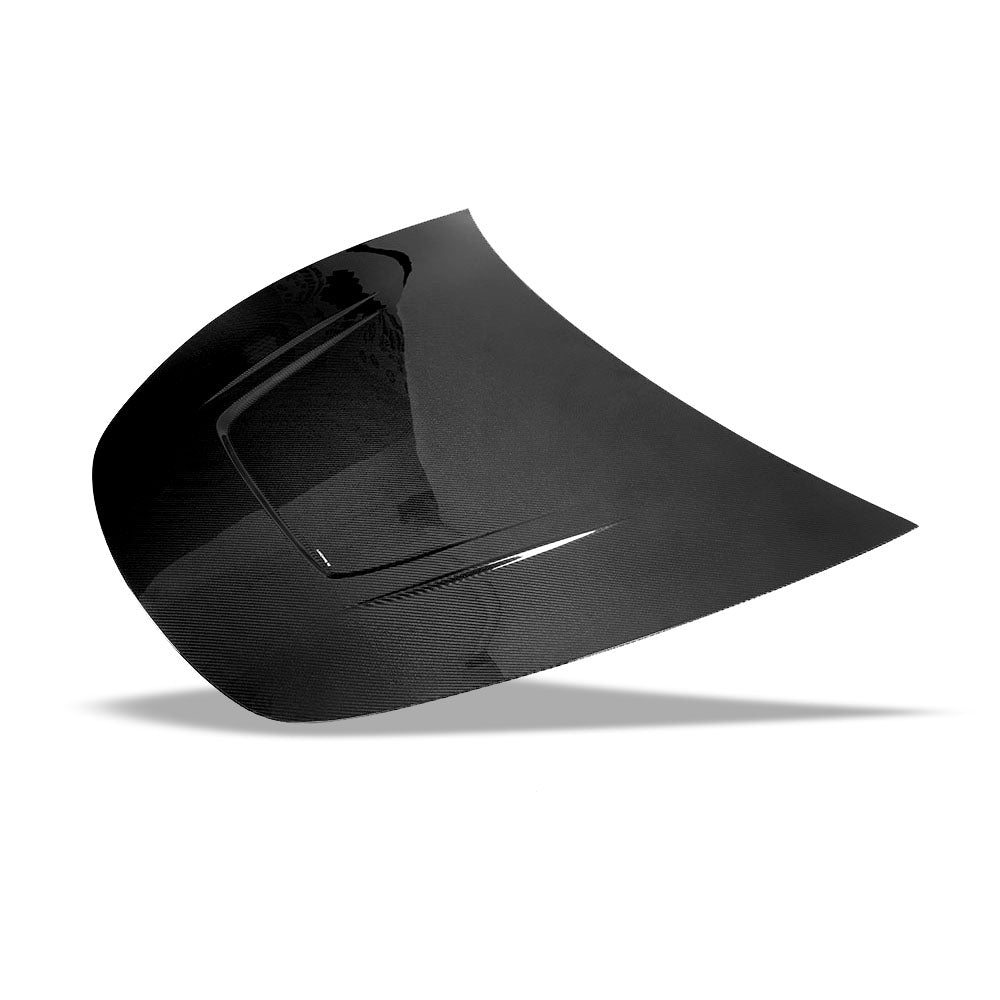 Carbon fiber weave detail across the 2021-2024 Model Y hood surface