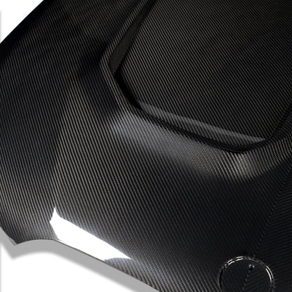 BMW X6M F96 carbon bonnet shown from the front three-quarter