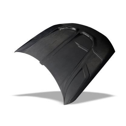 Angled view of the X6M F96 carbon fiber hood styling