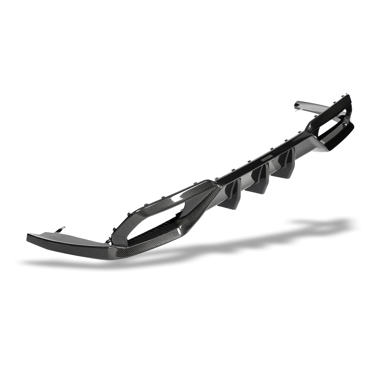 BMW M8 F93 carbon fiber rear diffuser fin detail close-up