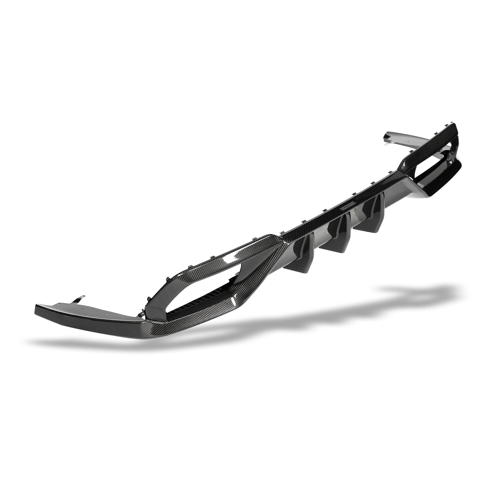 BMW M8 F93 carbon fiber rear diffuser fin detail close-up