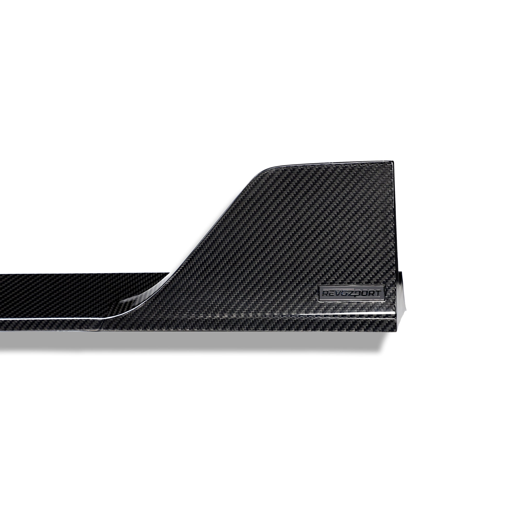 Close-up of carbon fiber side skirt edge and finish