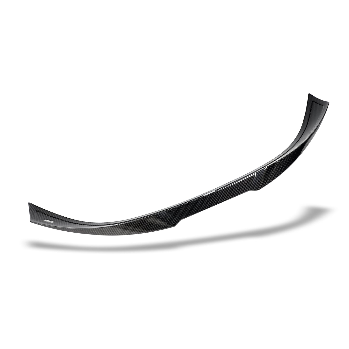 Carbon fiber spoiler end cap detail on BMW M8 deck
