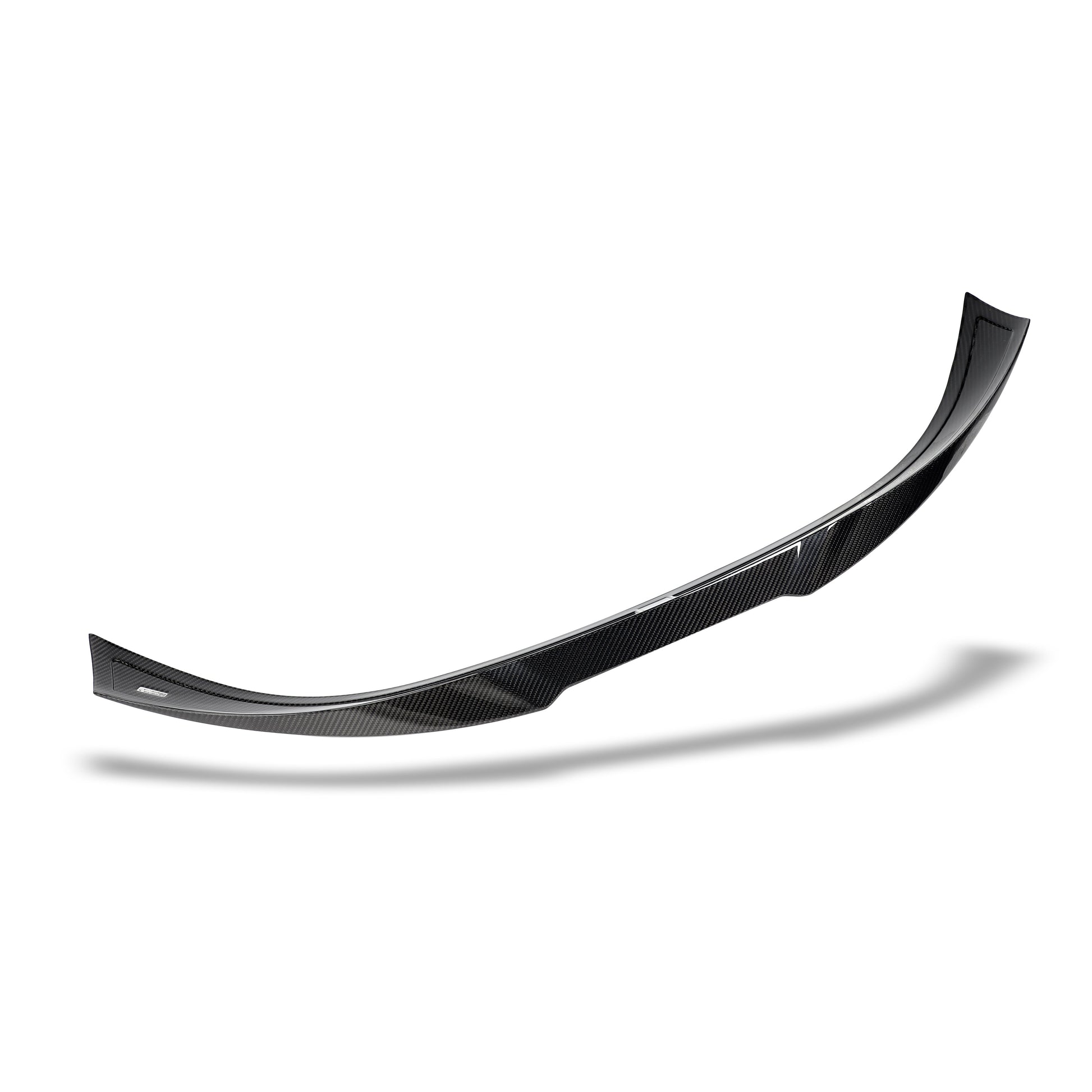 Carbon fiber spoiler end cap detail on BMW M8 deck